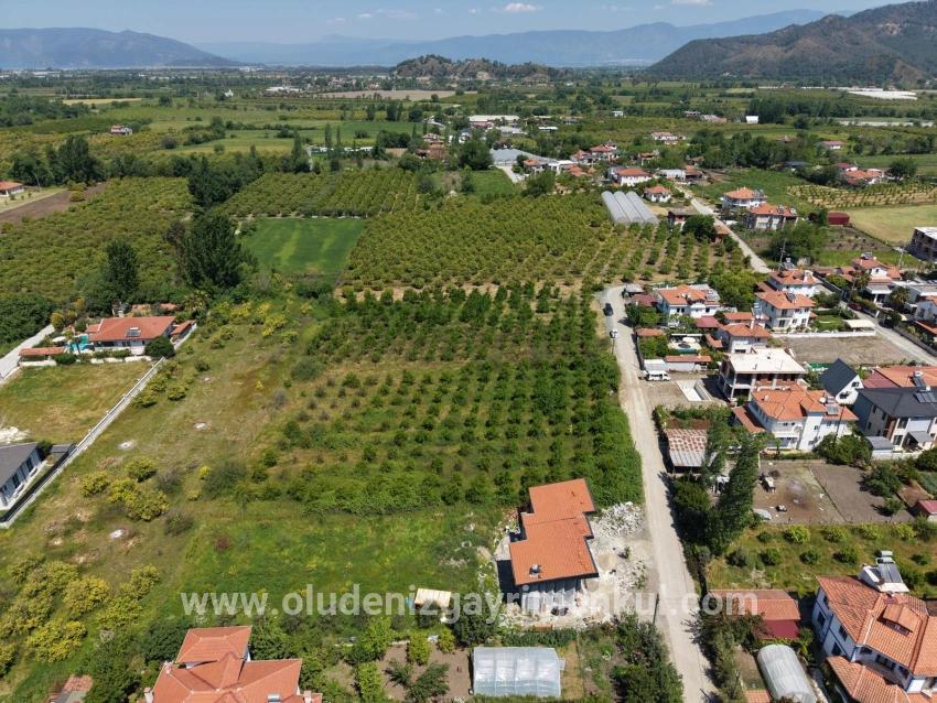 Okçular'da 1050m2 Köy Yerleşik Alanında Satılık Arsa